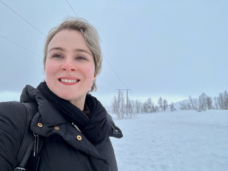 Image © Marta Koch. Author Marta Koch conducting research fieldwork with technology development and deployment stakeholders in Norwegian Arctic. 